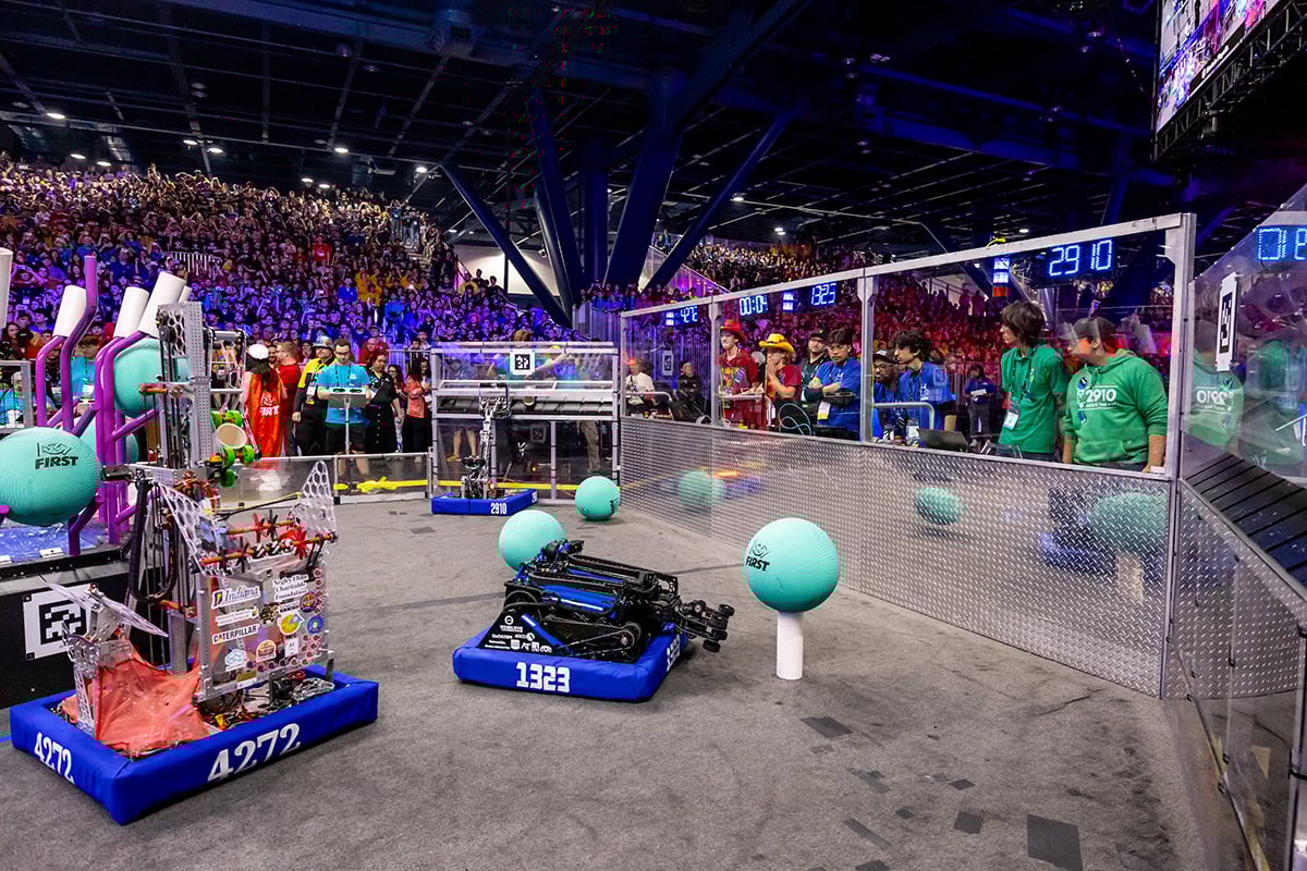 FIRST Robotics Competition students driving robots at FIRST Championship