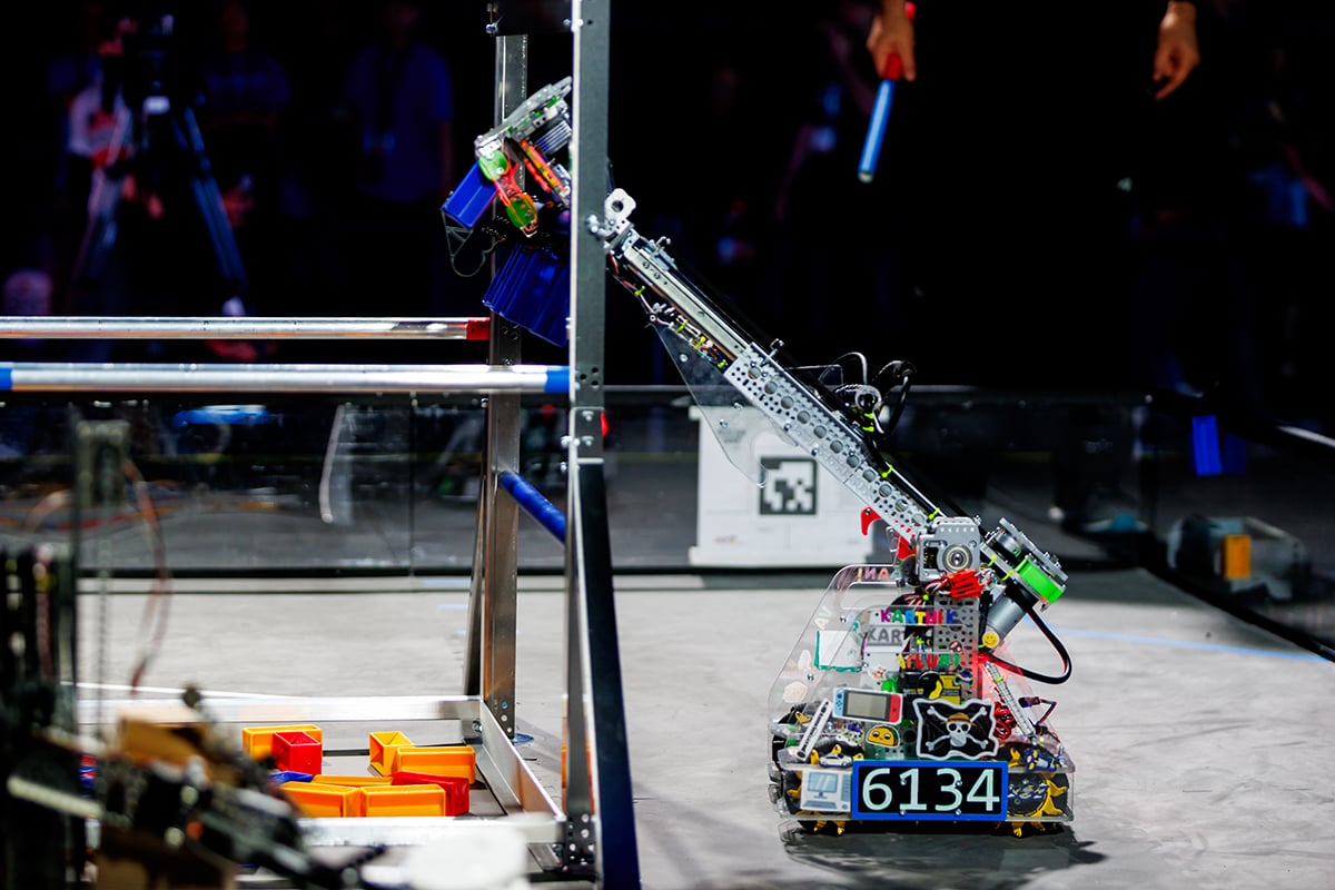 FIRST Tech Challenge robot scoring game object at FIRST Championship