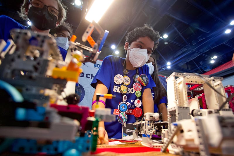 FIRST LEGO League Challenge teams with their robots at FIRST Championship in Houston on April 20, 2022. 